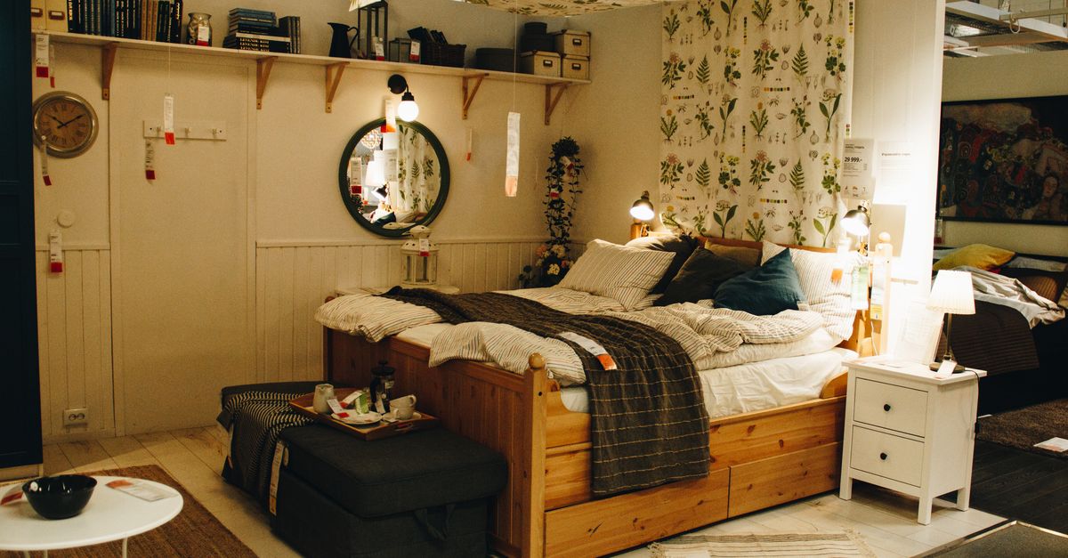 Neatly made bed with white pillows in a modern bedroom